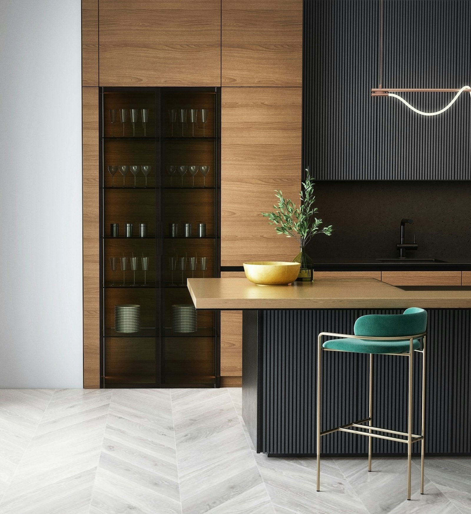 Cocina a medida en madera de nogal y frentes negros con isla e iluminación de diseño